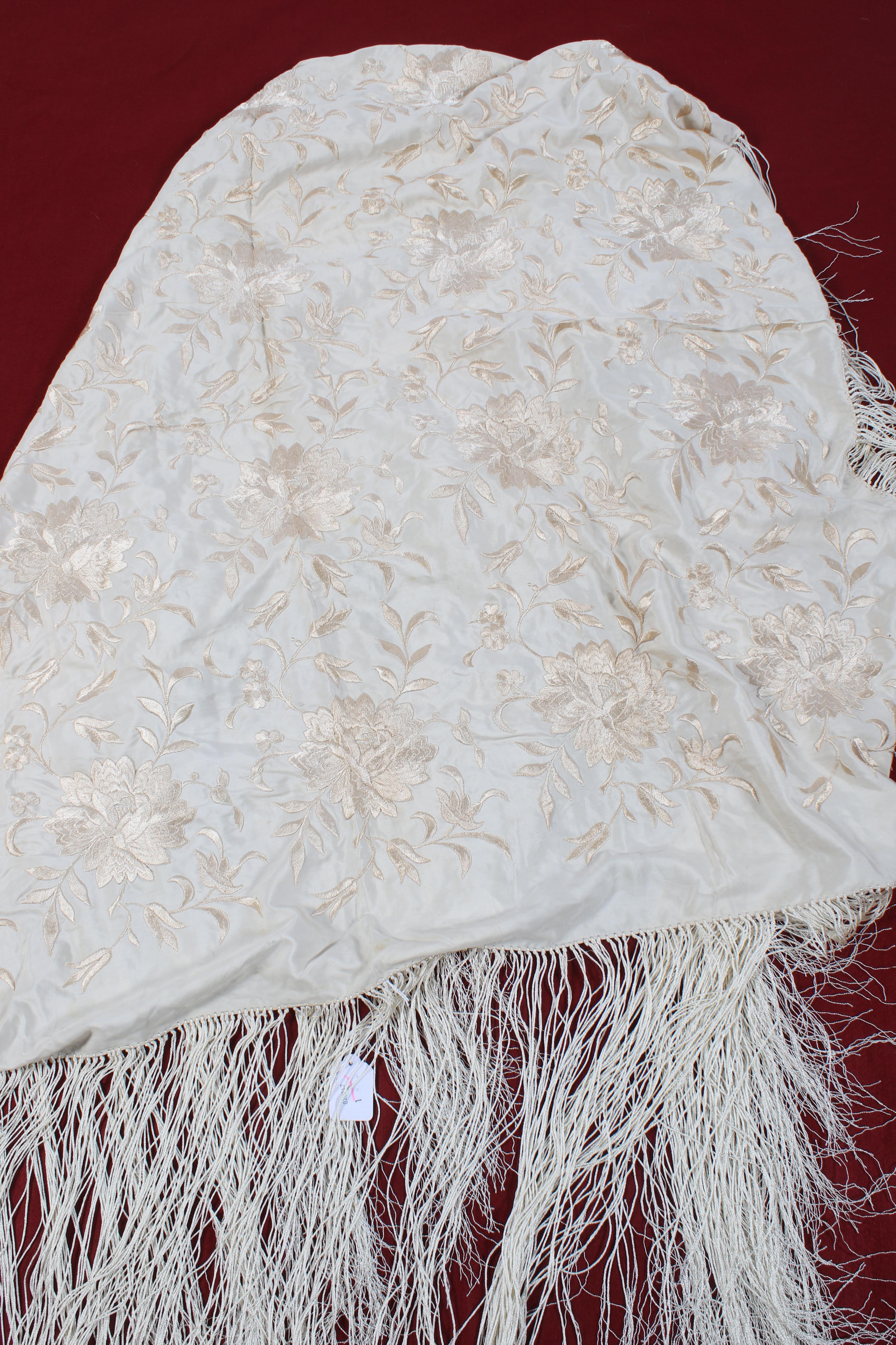 A 20th century cream silk embroidered shawl. - Image 2 of 5
