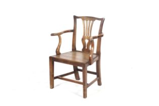 A Georgian mahogany chippendale style armchair.