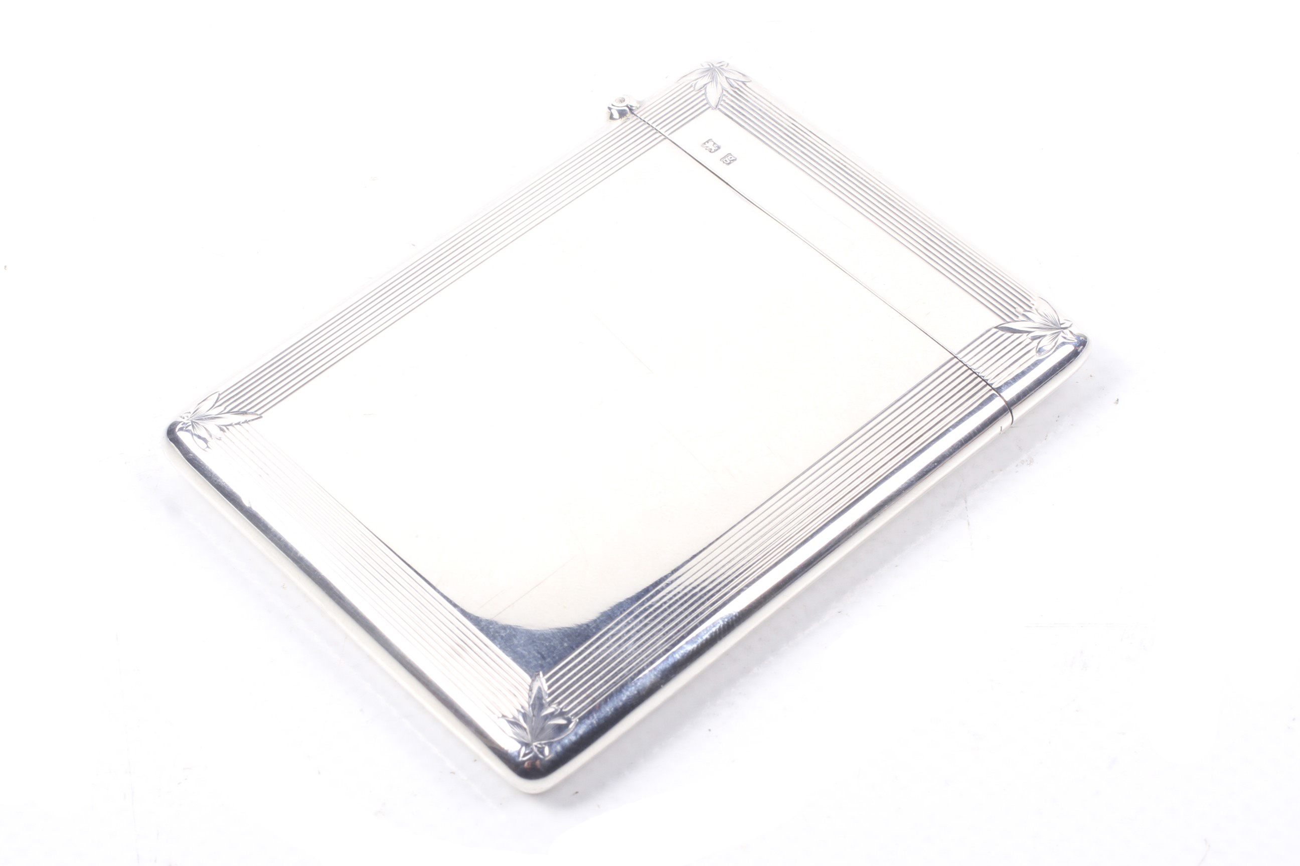 An Edwardian silver rectangular card case.