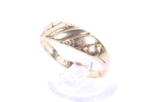 An early 20th century gold tapering band ring.