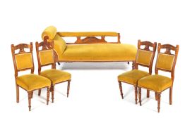 An Edwardian chaise longue and four matching chairs.