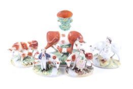 Five 19th century Staffordshire cow figures.