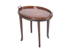 A Victorian mahogany inlaid tray on stand.