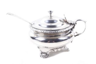 A George IV silver round mustard pot.