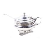 A George IV silver round mustard pot.