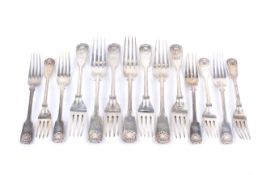 A collection of Victorian silver fiddle, thread and shell forks.