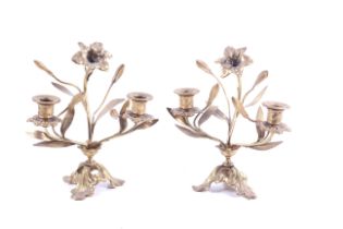 A pair of gilt metal 'Art Nouveau' style candelabra.