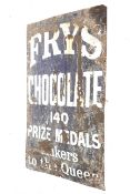 A large vintage Frys Chocolate advertising sign.