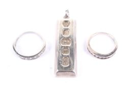 An 18ct white gold and diamond half-eternity ring and other items.