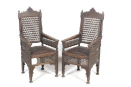 A pair of Moorish style chairs.