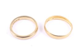 Two vintage 22ct gold wedding bands.
