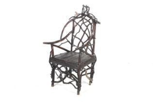 An early to mid-20th century 'Tree Branch' armchair.