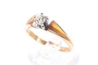 An early/mid 20th century gold and diamond solitaire ring. The round brilliant approx. 0.