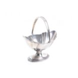 A silver shaped-oval pedestal sugar bowl.