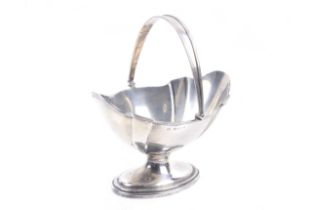 A silver shaped-oval pedestal sugar bowl.