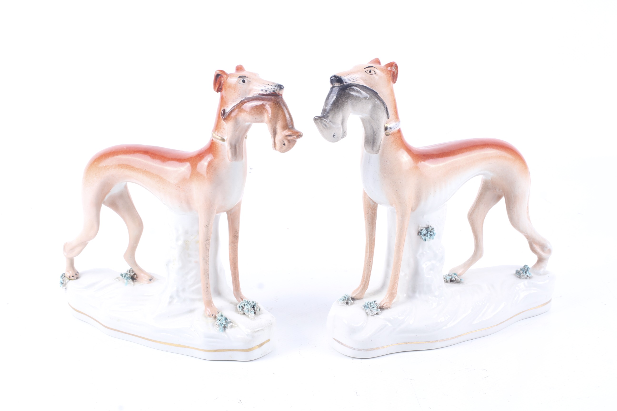 A pair of Victorian Staffordshire greyhounds.