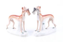 A pair of Victorian Staffordshire greyhounds.