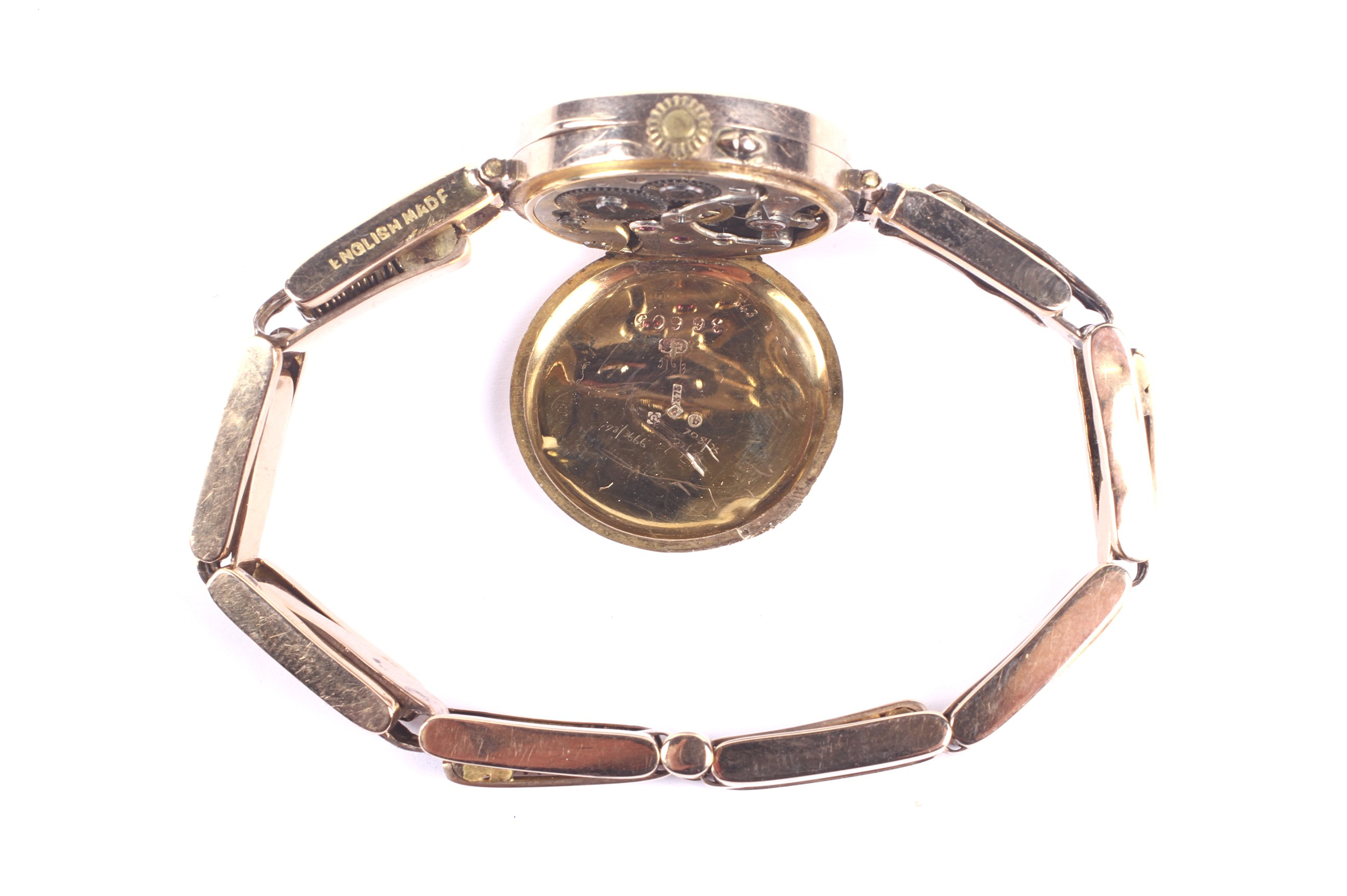A lady's 9ct gold, ruby and diamond set bracelet watch, circa 1911. - Image 4 of 5