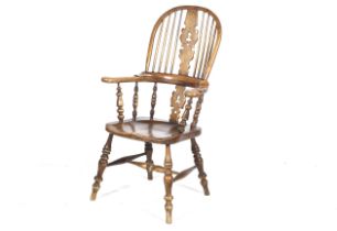 A mid-20th century Victorian style ash Windsor chair.