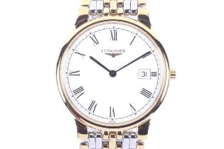 Longines, a gentleman's gold-plated and stainless steel quartz bracelet watch.