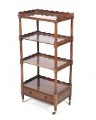 An early 19th century rosewood three tier buffet.