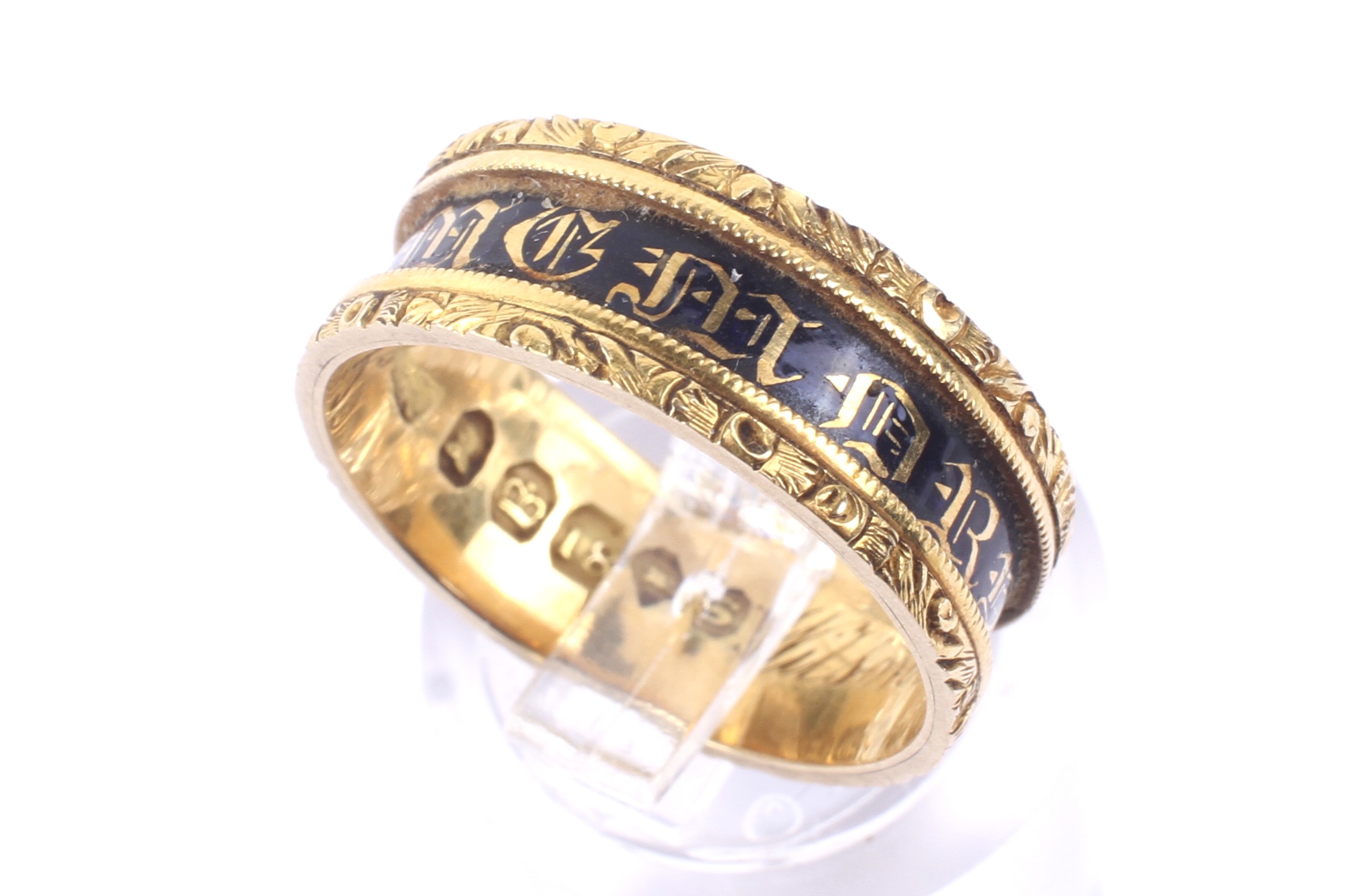 A William IV 18ct gold gold and black enamel broad mourning ring.