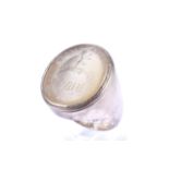 A vintage 9ct gold signet ring set with an oval Victorian chalcedony matrix.