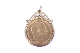 A half-sovereign, 1907, later mounted in a 9ct gold pendant.