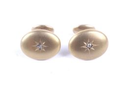A pair of vintage gold and diamond oval cufflinks.