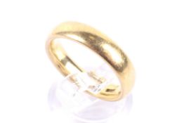 A vintage 22ct gold court-section wedding band. Hallmarks obscured probably Birmingham 1970, 4.