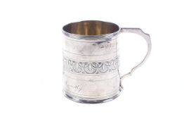 A George III silver straight sided christening cup.