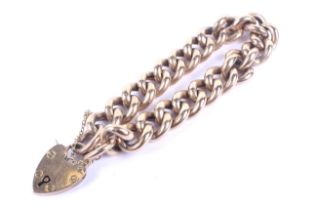 An early 20th century rose gold hollow-curb bracelet.