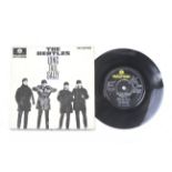 A Beatles 'Long Tall Sally' vinyl single record with the signatures of all four band members.