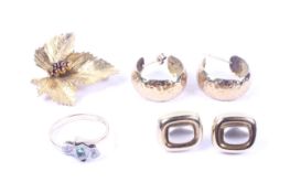 A small collection of early 20th century and later gold jewellery including an emerald and diamond