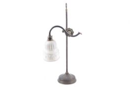 An early 20th century brass electric table lamp.