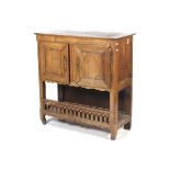 An 18/19th century French wooden two door sideboard.