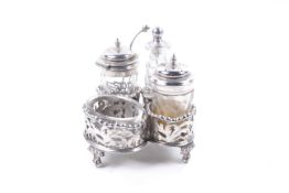 A late Victorian silver four piece cruet set and stand.