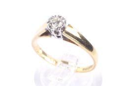 A vintage 18ct gold and diamond solitaire illusion ring. The round brilliat approx. 0.