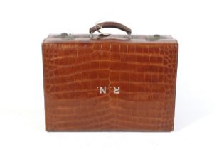 A early 20th century gentleman's alligator skin travelling suitcase.