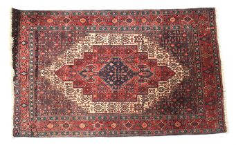 A red ground rug.