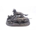 A bronze sculpture showing dogs hunting a pheasant. Signed 'P.J. Mene', L39cm.