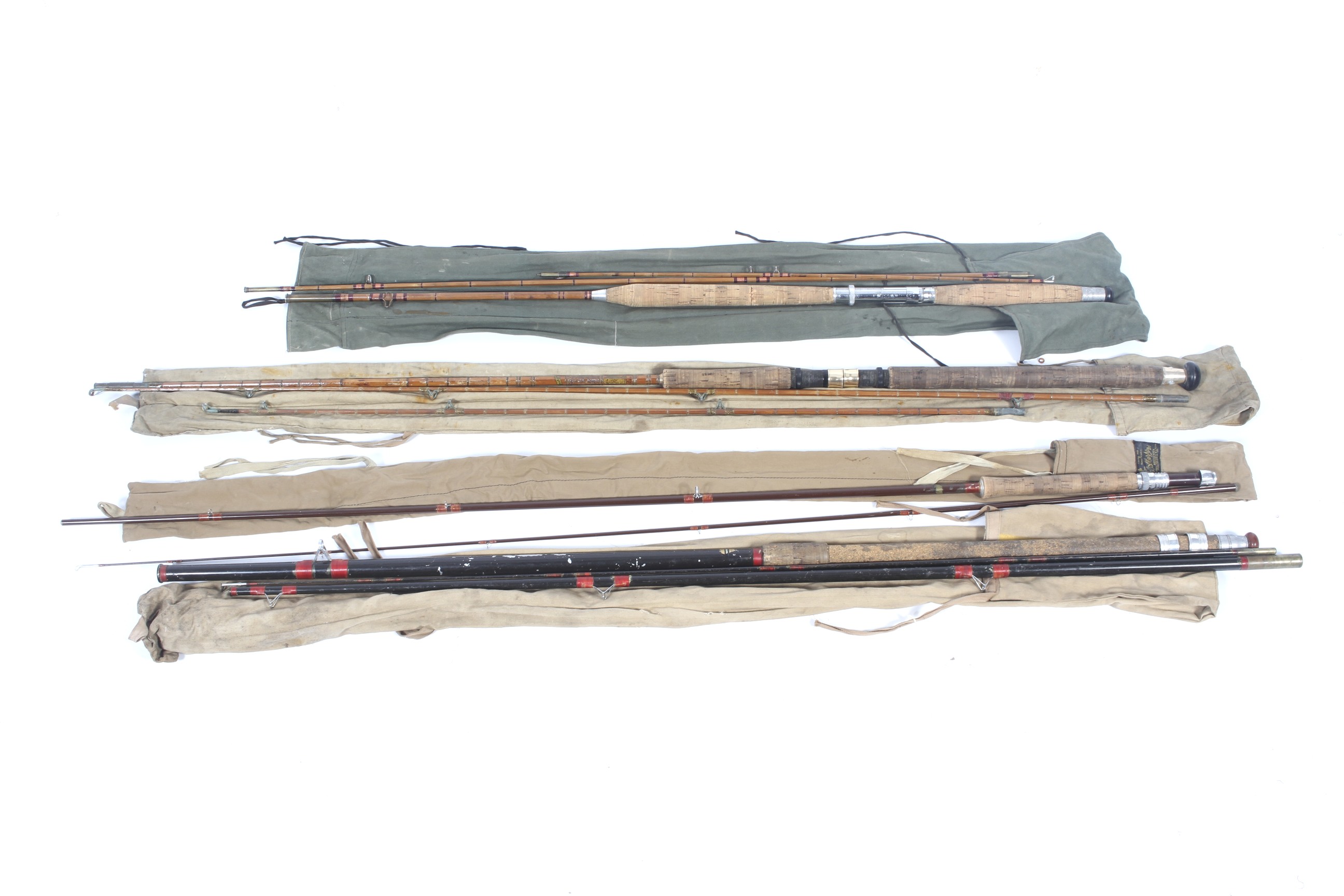 A collection of spinning and Float fishing rods.