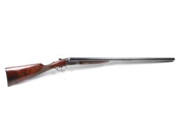 A Felix Saraqueta 12 gauge side by side shotgun. S/N 54367, 27.