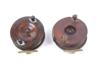 Two vintage large wooden 'Starback' sea fishing reels.