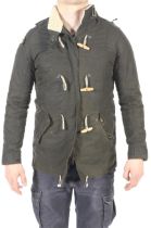 A Barbour ladies wax jacket. With white fleece lining and a hood, size 10.
