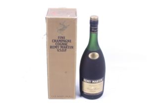 A bottle of Remy Martin fine champagne cognac. Boxed, 94.6cl, no vol shown.