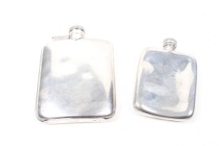 Two pewter concave hip flasks.