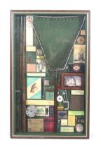 A collection of framed vintage fishing tackle.