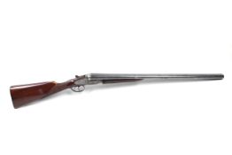 A Silver Kestrel 12 gauge side by side shotgun.