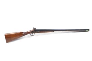 A Pedersoli 12 gauge side by side muzzle loading percussion shotgun. S/N K33204, 28.